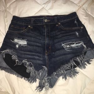 High waisted dark wash distressed jean short